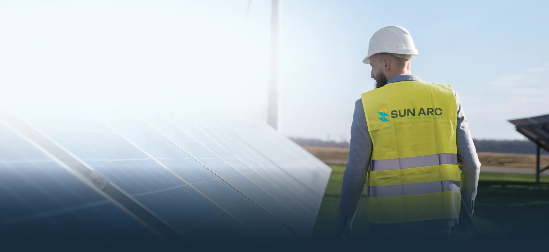 Sun Arc Solar engineer inspecting solar panels